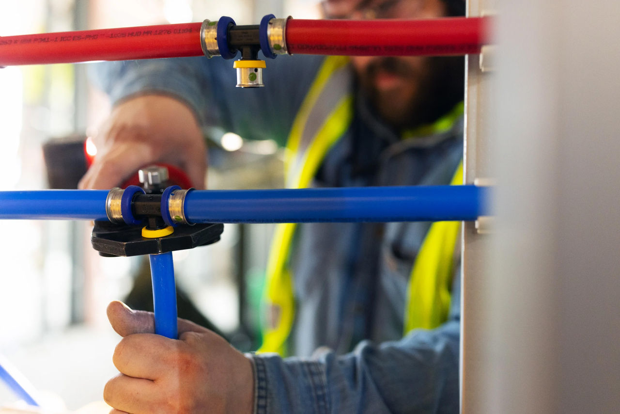 pureflow press installation Plumber installing PureFlow fitting